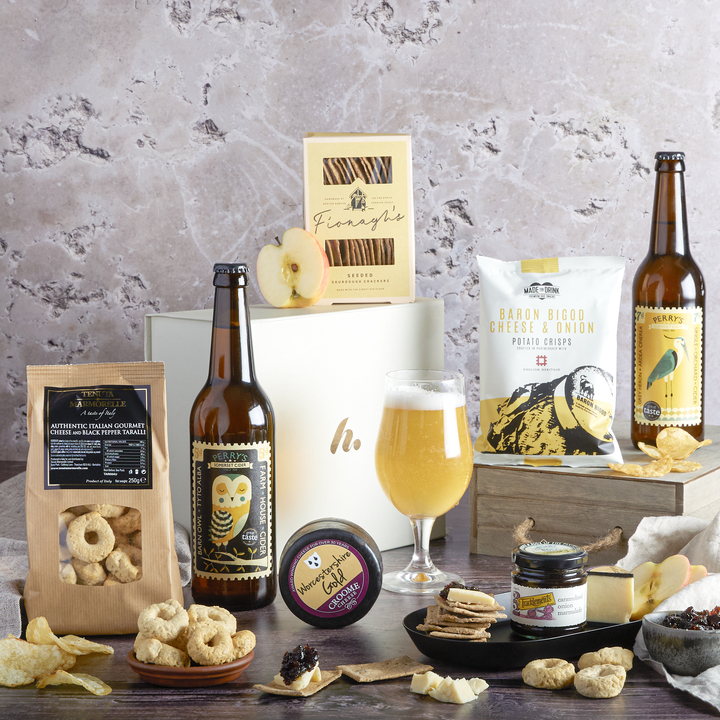 This image depicts a hampers.com gift hamper which features Fionagh's Sourdough crackers. An ideal gift for him.