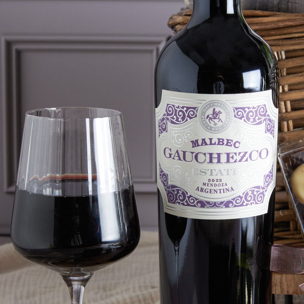 This image shows Gauchezco Estate Malbec - a luxury red wine featured in  the Premium Food and Wine Hamper by hampers.com