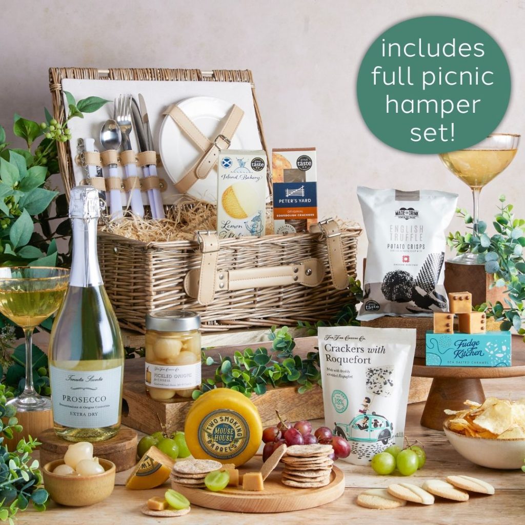 This image shows a carefully curated  gift hamper featuring artisanal foods and drinks  