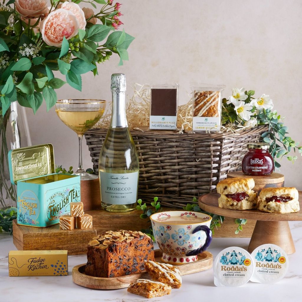 This image shows a carefully curated  gift hamper featuring artisanal foods and drinks  